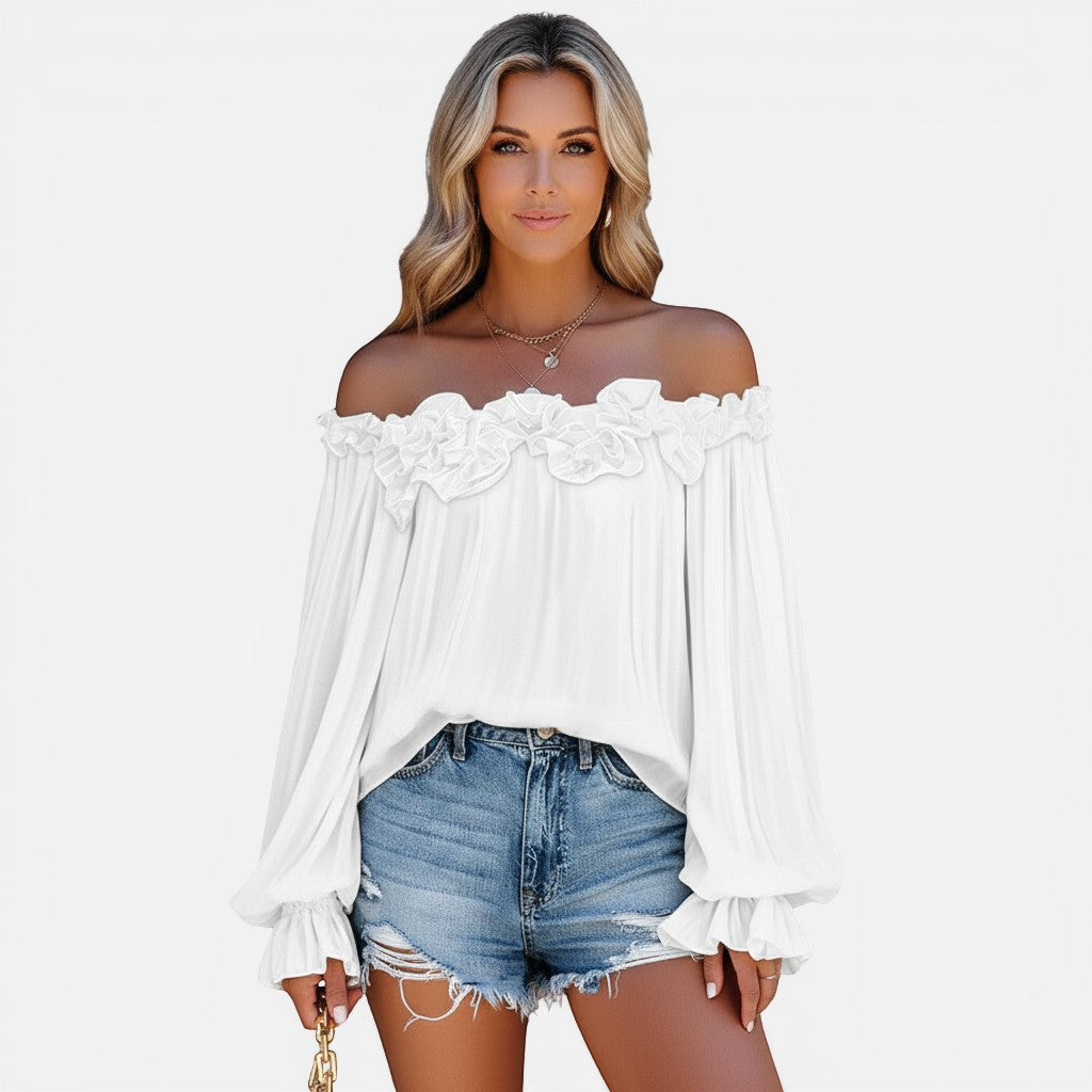 Femme wearing a stylish denim blouse from the Blouses Femme collection, paired with white jeans.