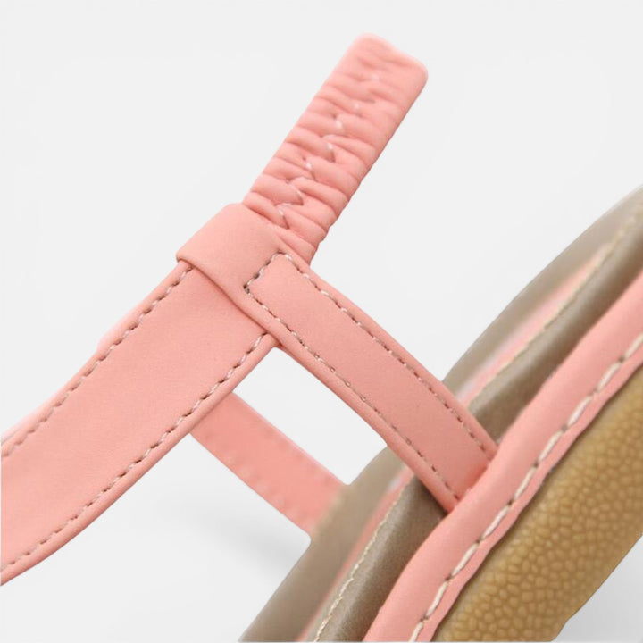 Laurior | Sandales plateforme décontractées pour femme avec bride à la cheville, détail de la bride en rose.