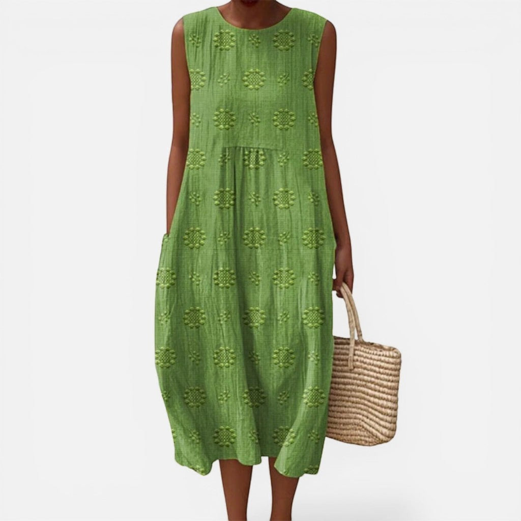 Laurior | Robe sans manches intemporelle taille plissée confort en vert avec pochette en osier.