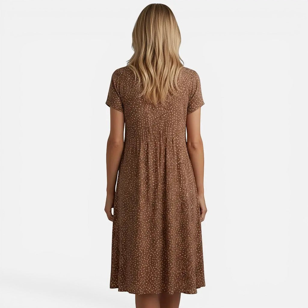 Laurior | Robe midi à pois pour femme, coupe décontractée et légère vue arrière.