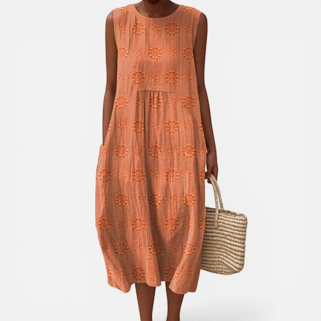 Laurior | Robe sans manches intemporelle taille plissée confort, robe d'été orange avec motifs, style élégant.