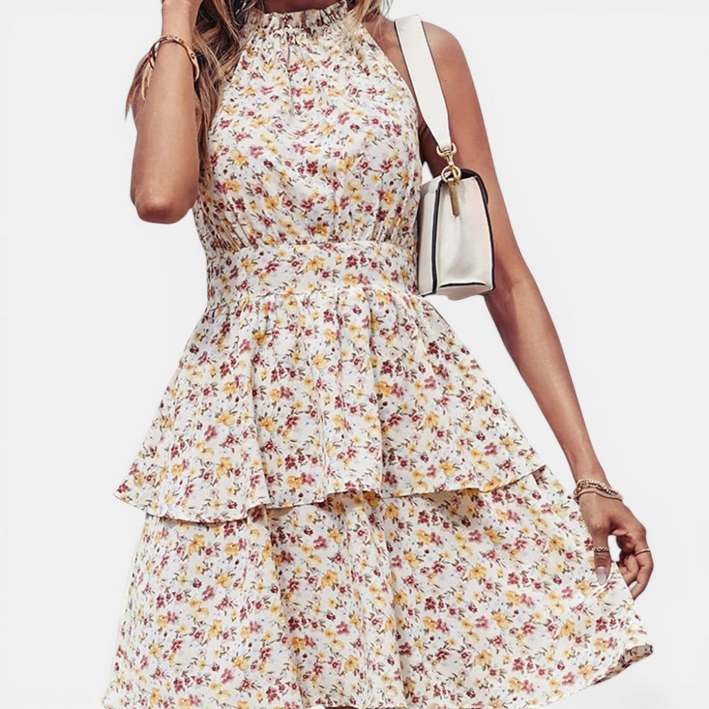 Laurior | Robe d'été à dos nu pour femme, pour la plage avec un design floral et une coupe fluide.