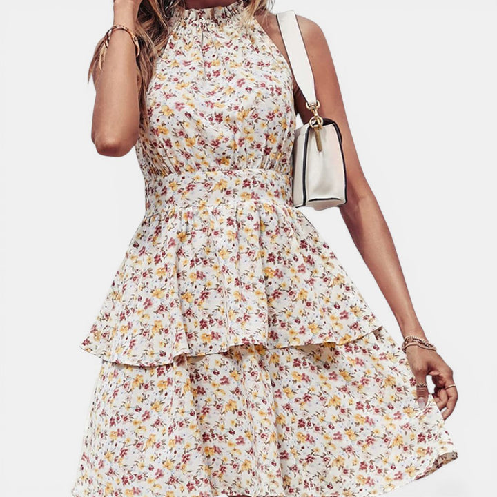 Laurior | Robe d'été à dos nu pour femme, pour la plage avec un design floral et une coupe fluide.