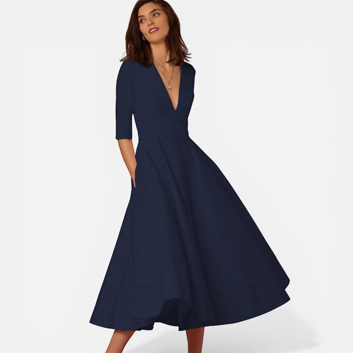 Laurior | Robe midi classique femme à col en V, légère et confortable, silhouette évasée en bleu marine.