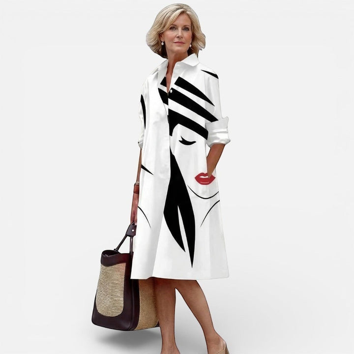 Laurior white midi shirt dress with black abstract face print and red lips. Lightweight, relaxed fit, perfect for daily wear.
