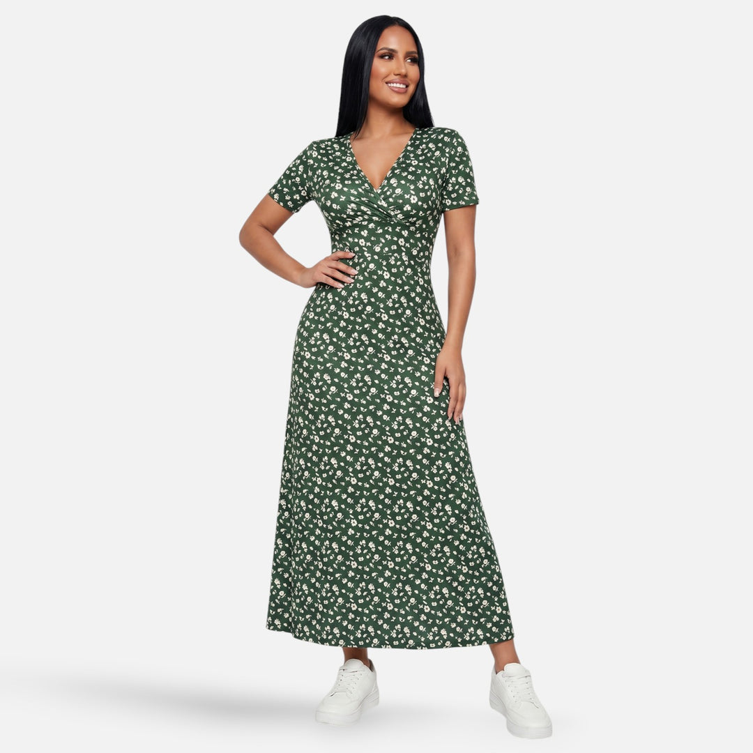 Laurior | Robe longue portefeuille fleurie silhouette empire pour femme portée par une femme, élégance florale.